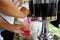 Women filling the glass at water cooler