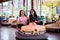 Women friends having fun at the amusement park, driving bumper car