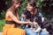 Women friends playing with dogs in the animal shelter