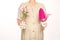 Women gardener tools pink colored bouquet flowers