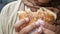 women hand holding beef burger top view