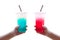 Women handle holding ice water italian soda red and blue in plastic cup