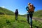 Women hiking in riverside mountains