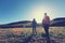 women hiking in sunrise mountains