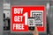 Women hold smartphone in hand, scan store QR code to e- coupon check price receive promotion and discount,cashless society concept