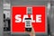 Women hold smartphone in hand,scan store`s QR code to e- coupon check price receive promotion and discount,concept use applicatio