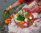 A Women is holding a borondala Pooja thali for worshipping God of religious offering