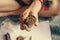 women holding a cannabis grinder in the room ,Drugs narcotic concept. Legal Marijuana