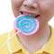 Women holding round swirl lollipop colorful