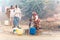 Women india collect water.India, Govardhan, November 2016