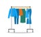 Women jeans clothes hanging on hanger rack