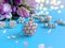 Women jewelry pink opan and white pearl  with tulips Bouquet   flowers petal  on blue  accessory background