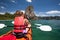 Women are kayaking in the open sea at the Krabi shore, Thailand