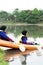 Women kayaking in the Taman Tasik Cempaka lake in the morning