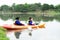 Women kayaking in the Taman Tasik Cempaka lake in the morning