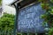 Women, Life, Freedom sign on chalkboard