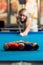 Women Lining Ball Up To Break In Pool