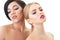 Women in love. Caucasian blond girl and beautiful young girls posing in studio over white background. Fashion, beauty, glam, youth