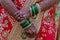 Women in Maharashtra, wear Green bangles in their hands in marriage function as green bangles and golden bangles