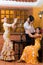 Women and man in traditional flamenco dresses dance during the Feria de Abril on April Spain