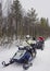 Women managing snowmobile in Ruka of Lapland