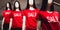 Women mannequins in red T-shirts with the inscription `sale`