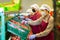 Women with mask sorting peaches