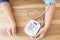 Women measures her blood pressure and heart rate