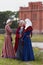 Women in medieval clothes during re-enactment event