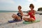 Women meditation on beach