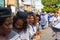 Women members of the cultural event Encontro de Chegancas, in Saubara Bahia, parade through the streets of the city dancing and