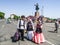 Women and men in the Kyrgyz national dress.