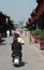 Women on moped in old town of Pingyao