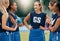 Women, netball and team talking, happy and smile after training, game or match on a court outdoor. Team, collaboration