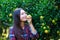 Women owner tangerine garden checking quality product and Grab a tangerine and smell it in her garden.and look at her very happy