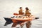 Women paddling on a lake in a kayak