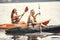 Women paddling on a lake in a kayak