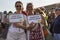 Women participate in the Lazio Pride event in Rome and pose happy for the camera