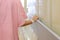 Women patient hand holding to handrail in hospital