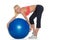 Women pilates exercises with a ball