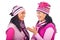 Women in pink knitted clothes having conversation