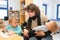 Women playing with kids in day care center