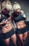 Women posing with perfect abdomen muscles