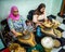 Women processing argan oil