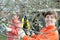 Women pruned branches in the orchard