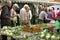 Women purchasing fresh cauliflower from the market in Husum