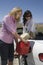 Women Refueling Fuel In Car