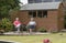 Women relaxing in a garden seated on a patio