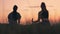 Women relaxing outdoor, summer evening picnic. Friends talking and eating snacks