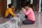 Women repairing fishing nets near Da Nang